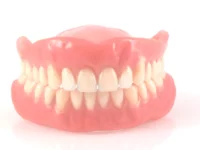 Naprawa protezy (dostawienie zęba, dostawienie klamry, pęknięcie protezy)